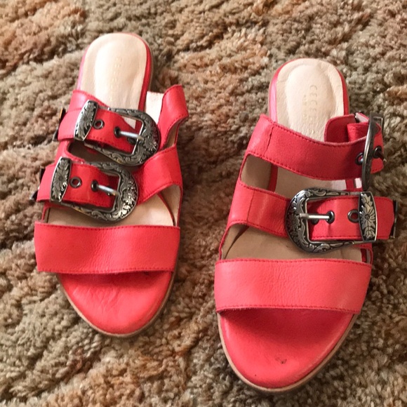 red buckle sandals